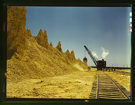 John Vachon, Nearly exhausted sulphur vat from which railroad cars are loaded, Freeport Sulphur Co., Hoskins Mound, Texas, 1943.