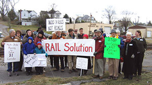 Kathy Shearer, RAIL Solution rally along the I-81 Corridor, Abingdon, Virginia, 2005. Used with permission. RAIL Solution fought I-81 privatization and advocates a "steel interstate system" alongside the road.