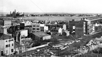 Old Smithsonian Institution Building (now known as the "Castle"), in upper left, viewed from downtown Washington. Washington Canal visible in upper right.  c. 1855. Courtesy of Smithsonian Institution Archives.
