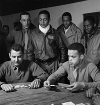 Toni Frissell, Tuskegee airmen playing cards in the officers' club in the evening, Ramitelli, Italy, 1945. Courtesy of the Library of Congress.