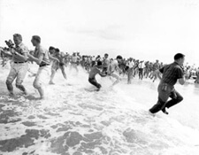 Figure 54. Segregationists trying to prevent blacks from swimming at a "white only" beach in St. Augustine, St. Augustine, Florida, 1964. Courtesy of the State Archives of Florida.