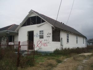Dorothy Moye, Upper Ninth Ward house with "KEN" marking from private contractor, 2009.