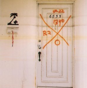Christina Bray, Successive water lines on door in Lakeview, 2007.