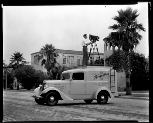 Burgert Brothers, Photographer and camera atop new Burgert Brothers truck parked by Davis Island pool building, Tampa, Florida, 1936. Catalog no.: PA 5906.