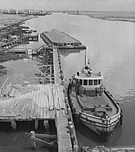 John Vachon, Library of Congress, Prints & Photographs Division FSA-OWI Collection Reproduction Number: LC-USW3-033887-D DLC, Tugboat in Louisiana, 1943.  