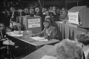 Aaron Henry, chair of the Mississippi Freedom Democratic Party delegation, speaks before the Credentials Committee at the Democratic National Convention, Atlantic City, New Jersey, August 22, 1964. Photograph by Warren K. Leffler. Courtesy of the Library of Congress Prints and Photographs Division, loc.gov/pictures/item/2003688166.