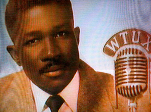 Mitch Thomas in his radio days at WTUX, Wilmington, Delaware, ca. early 1950s. Screenshot from Black Philadelphia Memories, directed by Trudi Brown (WHYY-TV12, 1999). Screenshot courtesy of Matthew F. Delmont.