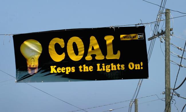 Coal industry banner, downtown. Logan, WV, 2006.