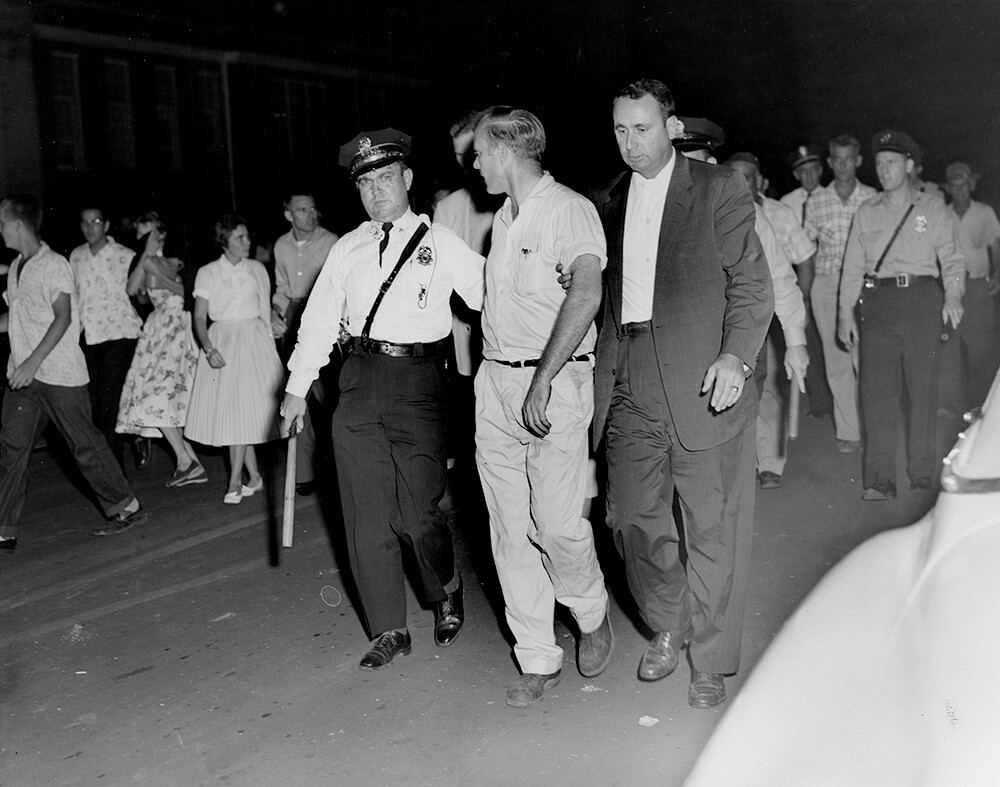 Police arrest a demonstrator, Nashville, TN, September 1957. © Nashville Public Library. Police arrest a demonstrator, Nashville, TN, September 1957. © Nashville Public Library.