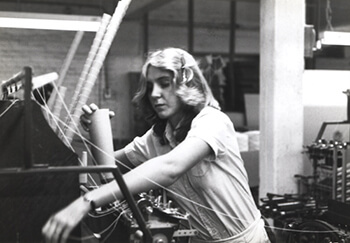 Blonde Woman Working in a Textile Plant, Tennessee, circa late 1970s. Courtesy of Special Collections and Archives, Georgia State University Library, Southern Labor Archives, Amalgamated Clothing and Textile Workers Union, Memphis-Jackson Joint Board Records, L1992_11_112.