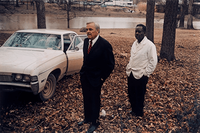 Untitled (Sumner, Mississippi, Cassidy Bayou in background), 1971, printed 1999. Photograph and dye-transfer print by William Eggleston. From At War with the Obvious, Metropolitan Museum of Art, Accession #2012.283. © Eggleston Artistic Trust.