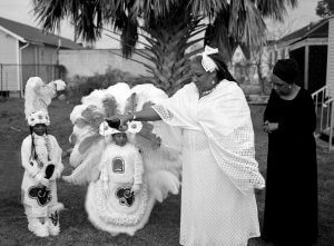 "To the Ancestors," Guardians of the Flame Arts Society, Harrison family home, Upper Ninth Ward. New Orleans, Louisiana, morning of Mardi Gras, 2007. Photograph by Lewis Watts. Courtesy of Lewis Watts.