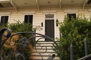 Step Up, Moss Street, Faubourg St. John, New Orleans, Louisiana, 2010. Photograph by Cynthia Scott. Even well groomed houses have kept the X, almost as a badge of courage. © Cynthia Scott. Step Up, Moss Street, Faubourg St. John, New Orleans, Louisiana, 2010. Photograph by Cynthia Scott. Even well groomed houses have kept the X, almost as a badge of courage. © Cynthia Scott.