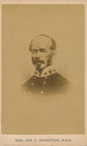Confederate General Joseph E. Johnston, commander of the Army of Tennessee during the first months of the Atlanta Campaign. Albumen print.