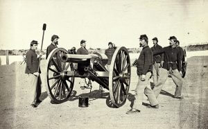 A twenty-pound Parrott Gun and its crew at Fort Richardson, Arlington Heights, Virginia, 1861–1865. The De Gress Battery was comprised of four rifled cannons of this type. Albumen print, ca. 1865.