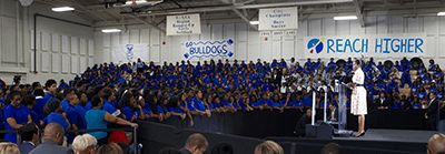 Michelle Obama speaks to students at Booker T. Washington High School, Atlanta, Georgia, August 8, 2014. Photograph courtesy of the US Department of Education, CC BY. School districts in historically black areas of the Atlanta metro region remain highly segregated.