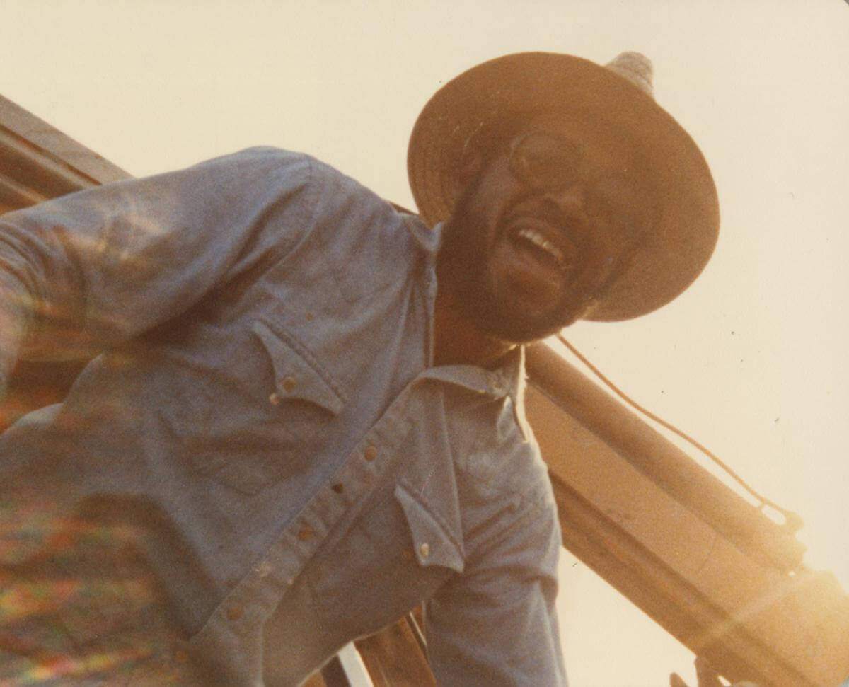 Isaac Scott smiling down at the camera