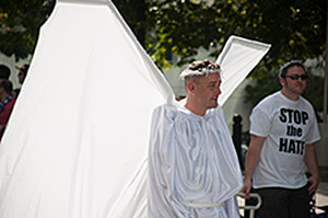 Stop the Hate. Bedsheet Angels march in the 2013 Atlanta Gay Pride Parade. Photograph by Nick Mickolas. Courtesy of Nick Mickolas.