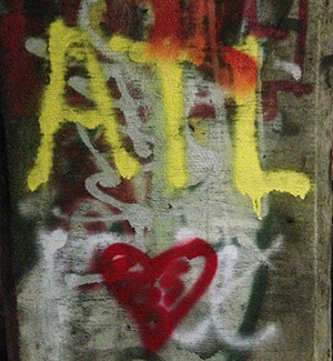 ATL, Love, graffiti in Atlanta, Georgia's Krog Street Tunnel, February 17, 2014. Photograph by Eric Solomon. From Eric Solomon.