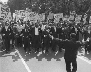 Jewish civil rights activist Joseph L. Rauh, Jr. marching with Martin Luther King, Jr., Washington, DC, August 28, 1963. Photograph by the now defunct United States Information Agency. Courtesy of the National Archives and Records Administration, National Archives Identifier 542002. Photograph in public domain.