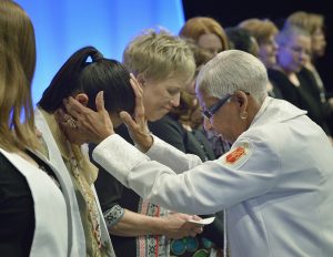 Deaconess consecrated at United Methodist Women's Assembly, Louisville, Kentucky, April 27, 2014. Photograph by Paul Jeffrey. Courtesy of Flickr user UMWomen. Creative Commons license CC BY-NC-ND 2.0.
