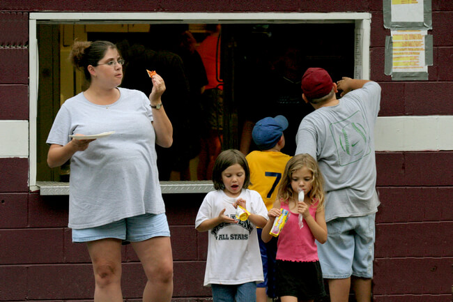 Patrons of Little League ball park concession stand. Omar, Logan County, WV, 2005.