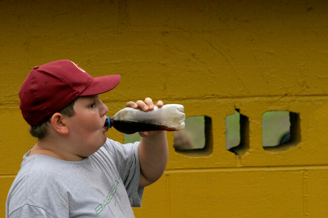 Patron of Little League ball park concession stand. Omar, Logan County, WV, 2005.