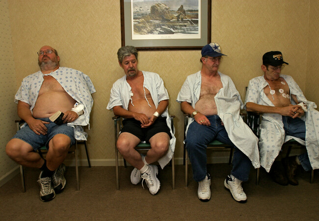 Deep miners await lung function testing to qualify them for black lung compensation. Beckley, WV, 2005.