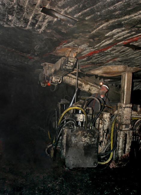 Roof bolting machine provides hydraulic support for mine roof and miners. Boone County, WV, 2005.