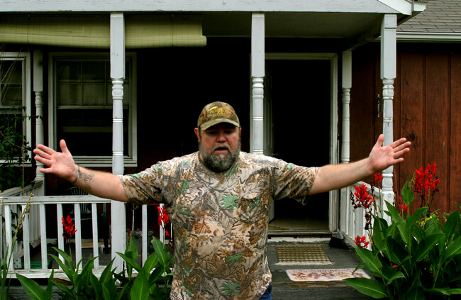 Intentional coal company bankruptcy and reorganization with new miners has forced many miners out of their jobs, homes, and communities with loss of health insurance and pension credit. Letcher County, KY, 2005.