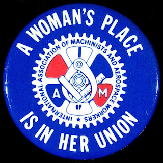 Photo of a button that says, "A woman's place is in her union."