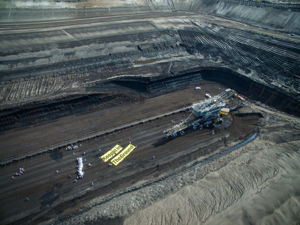 Overhead view of large open pit mine