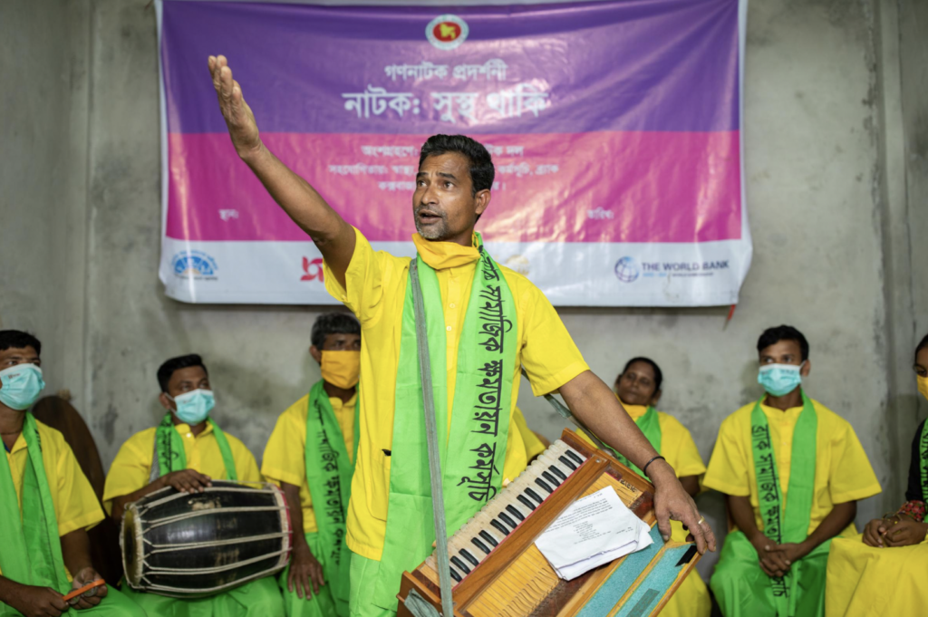 Popular theater groups singing about vaccination, Ramu, Bangladesh. Photograph by and courtesy of Abdullah Al Kafi.