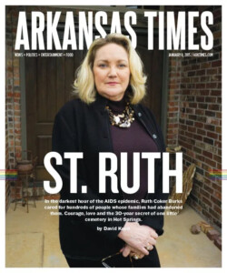 The cover of Arkansas Times magazine featuring a full page photograph of Ruth Burk, a light skinned middle-aged woman with blond hair. Across Burks in large text are the words "St. Ruth." Below is written "In the darkest hour of the AIDS epidemic, Ruth Coker Burks cared for hundreds of people whose families had abandoned them. Courage, love and the 30-year secret of one little cemetery in Hot Springs. By David Koon."