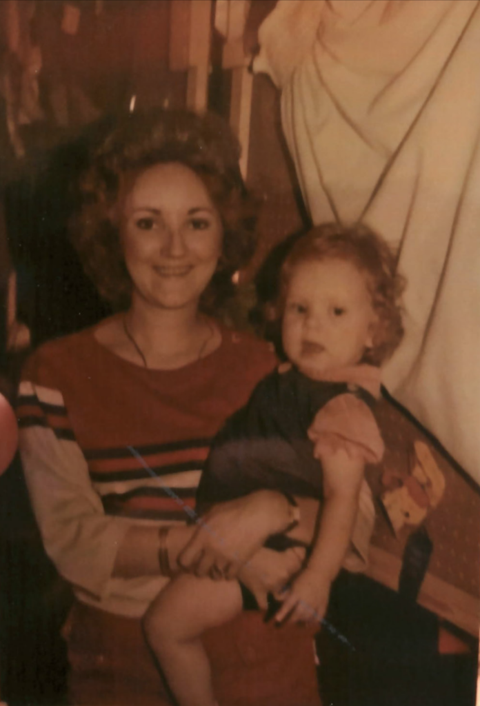 A photo of Ruth Burks holding her young daughter.