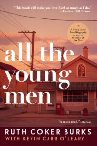 The cover of the book All the Young Men by Ruth Coker Burks with Kevin Carr O'Leary. In the background is a working class house. The cover includes an endorsement from Bill Clinton that reads "This book will make you love Ruth as much as I do" and from RuPaul which states "A must-read."