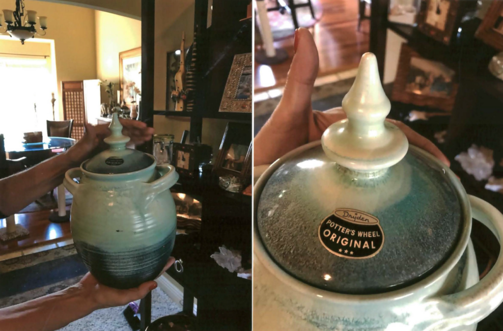 A blue, hand crafted urn.