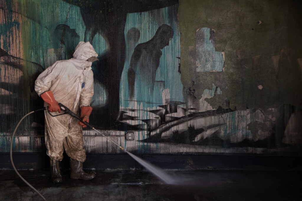 Pressure Washing Downtown Business.